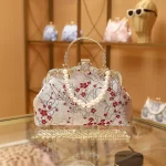 ARORA Chinese-Style Red Plum Blossom Handbag with Pearl Handle, Gold Frame & Chain Strap